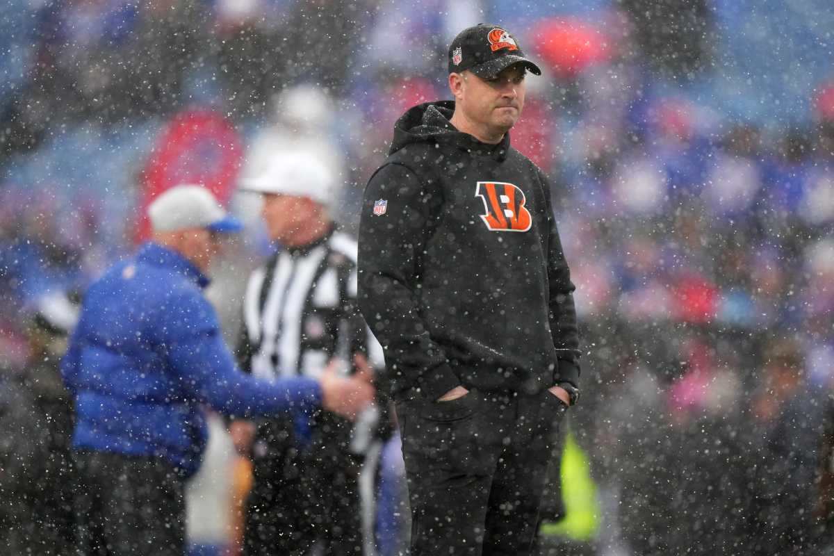 Zac Taylor looks out on the field before the Bengals-Bills game